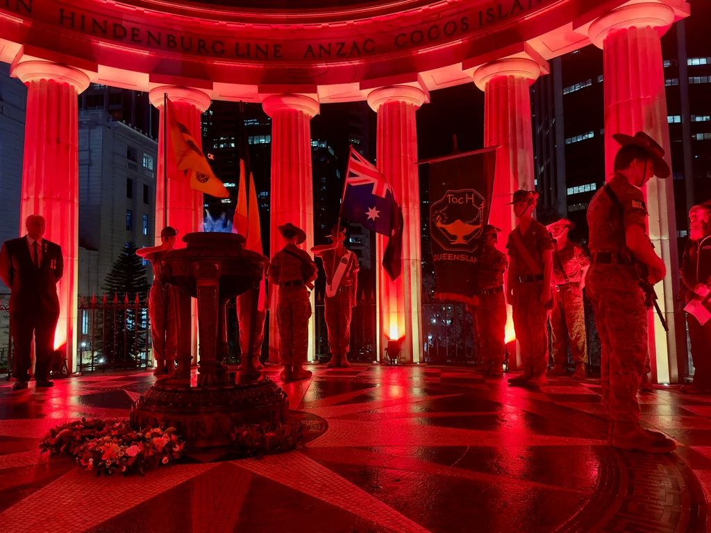 Cadets inside the Shrine of Remembrance with the Toc H Queensland banner and flags