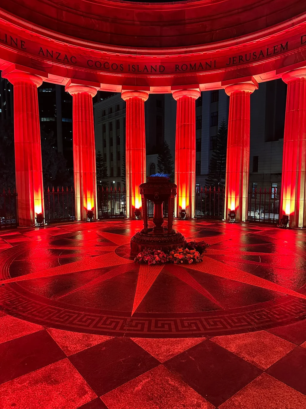 The empty Shrine of Remembrance after the 2026 service, wreaths at the Eternal Flame