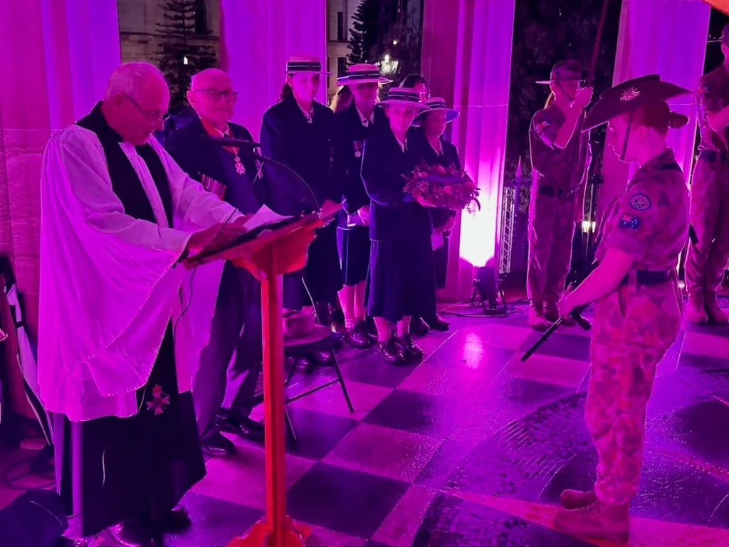 The officiant addresses the gathering