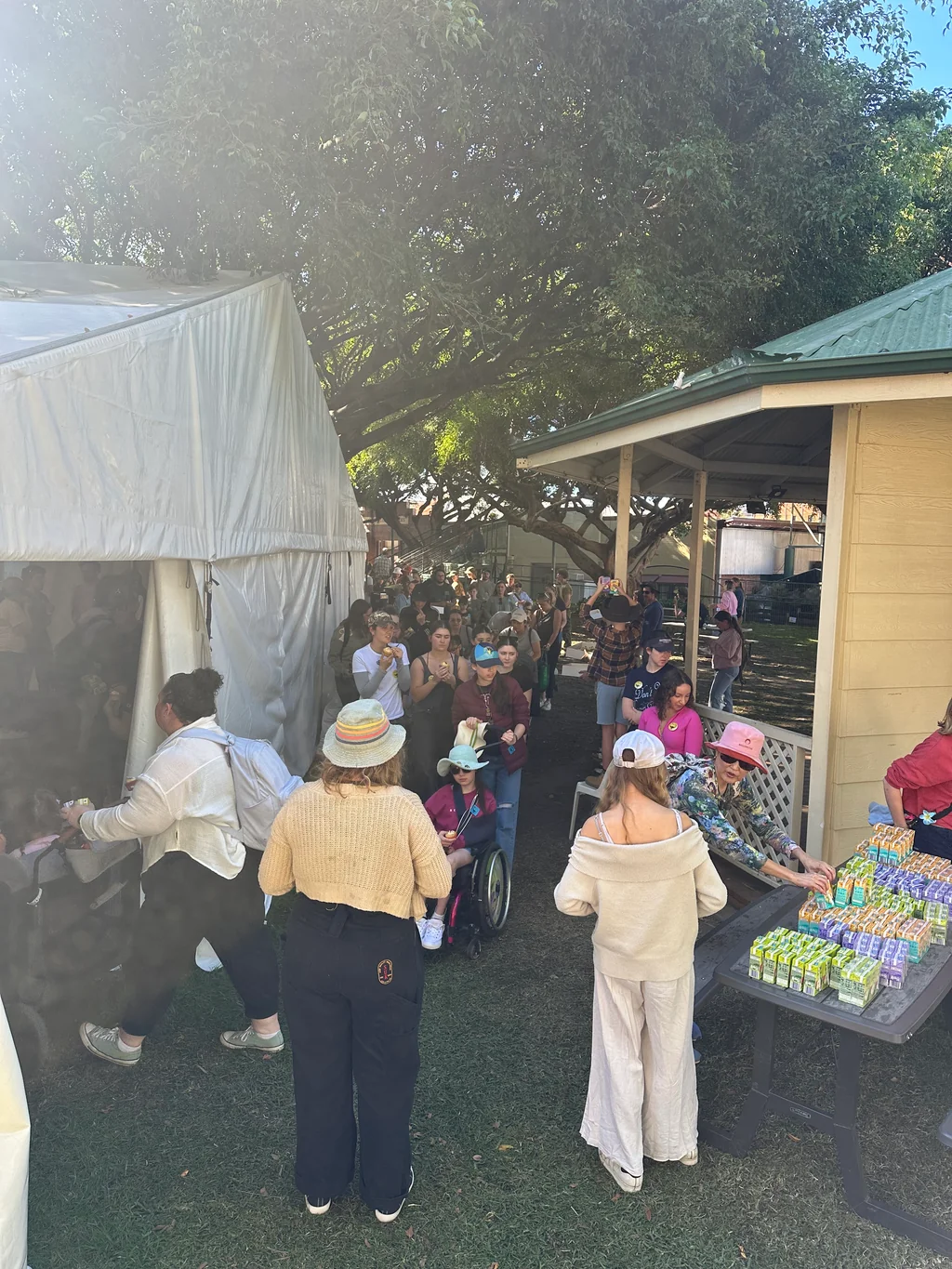Families filing into the marquee at the Toc H Queensland Ekka Outing