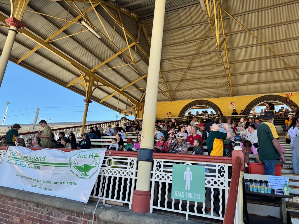 The John McDonald Pavilion packed with Toc H Queensland guests and families, Toc H banner visible