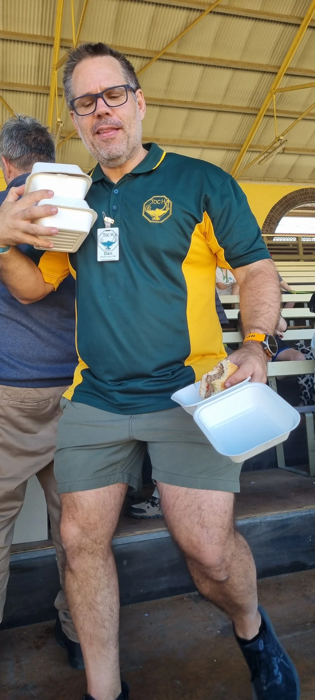 Toc H Queensland volunteer Dan serving lunch at the Ekka Outing
