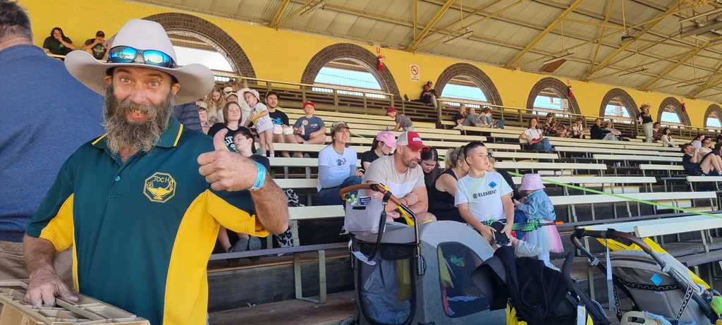 Toc H Queensland volunteer giving thumbs up at the John McDonald Stand