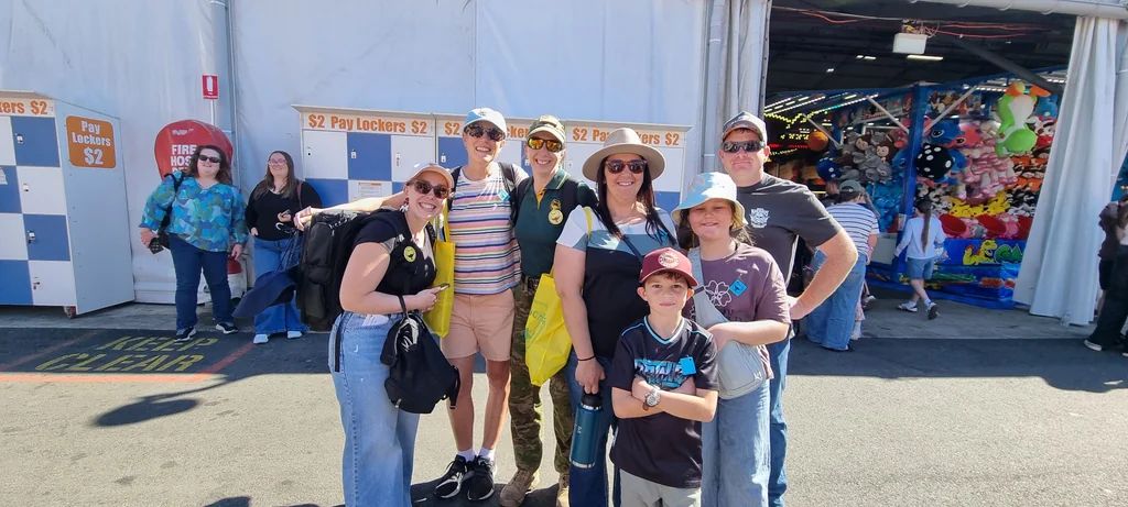 Toc H Queensland volunteers with a guest family at the Ekka Outing