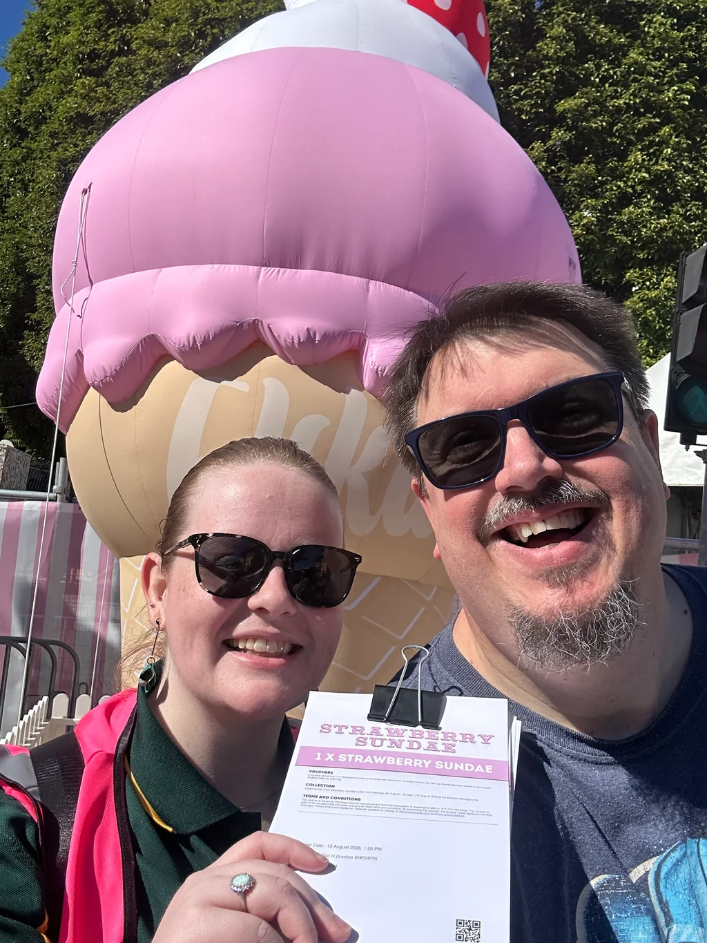 Laura Richards and Russel Gowrie on duty at the Ekka strawberry sundae stand — Toc H Queensland