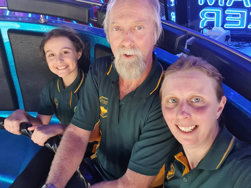 Three generations of a Toc H family enjoying a ride at the Ekka